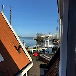 At The Harbor *